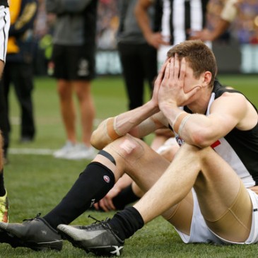 Mason Cox of the Collingwood Magpies demonstrating how the rest of the team, and most supporters, felt (Sept. 28, 2018 - Source: Darrian Traynor/Getty Images AsiaPac)